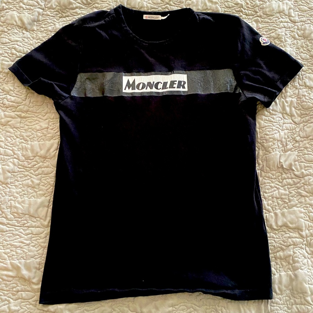 100 % Authentic Moncler Maglia T shirt . Has wear and Tear and Holes . Need Gone